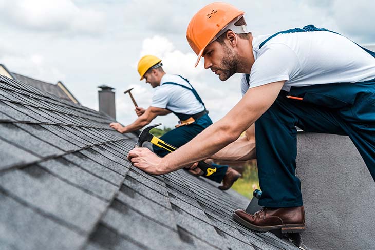 roofing contractors installing roof